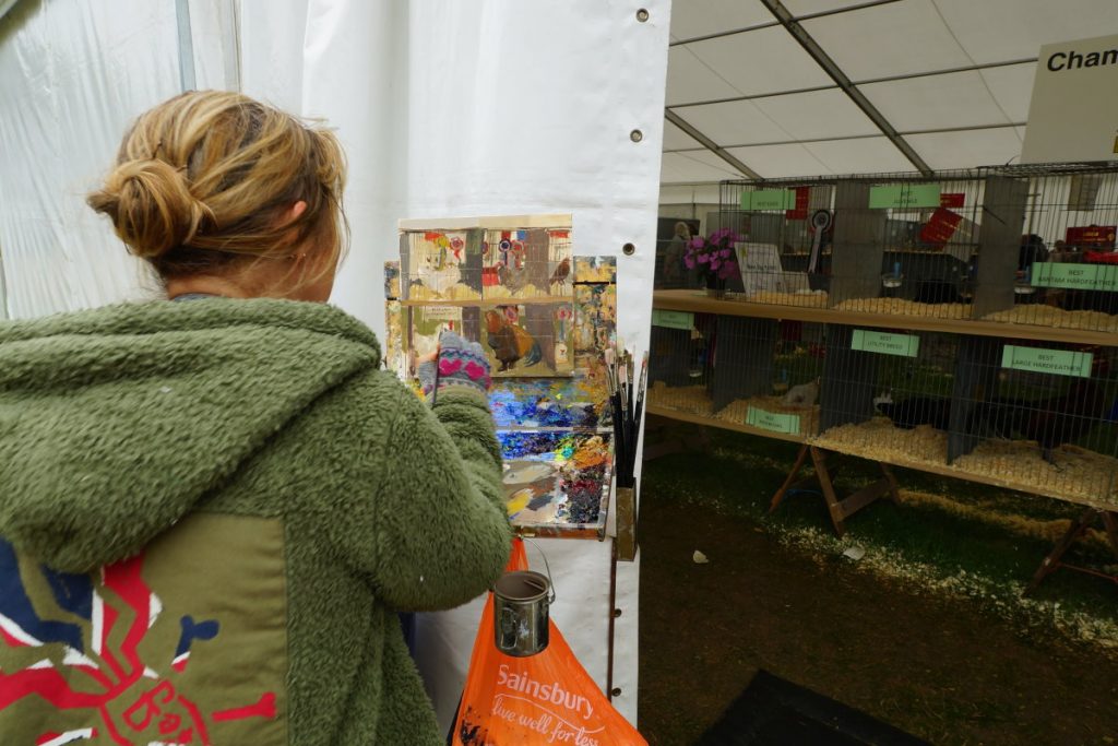 Haidee-Jo Summers painting Chickens at RNS17. Photo by Katy Jon Went