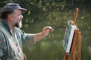 Artist John Behm painting like a modern Monet on the River Wensum, Paint Out Norwich 2017. Photo © Katy Jon Went