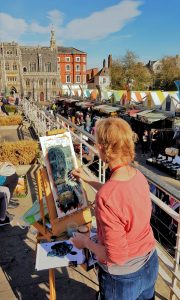 Artist Susan Isaac painting Norwich Market, Paint Out Norwich 2018. Photo © Katy Jon Went