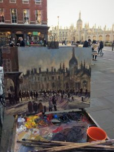 Artist Sarah Allbrook painting plein air, February sunshine on King’s Parade, Cambridge