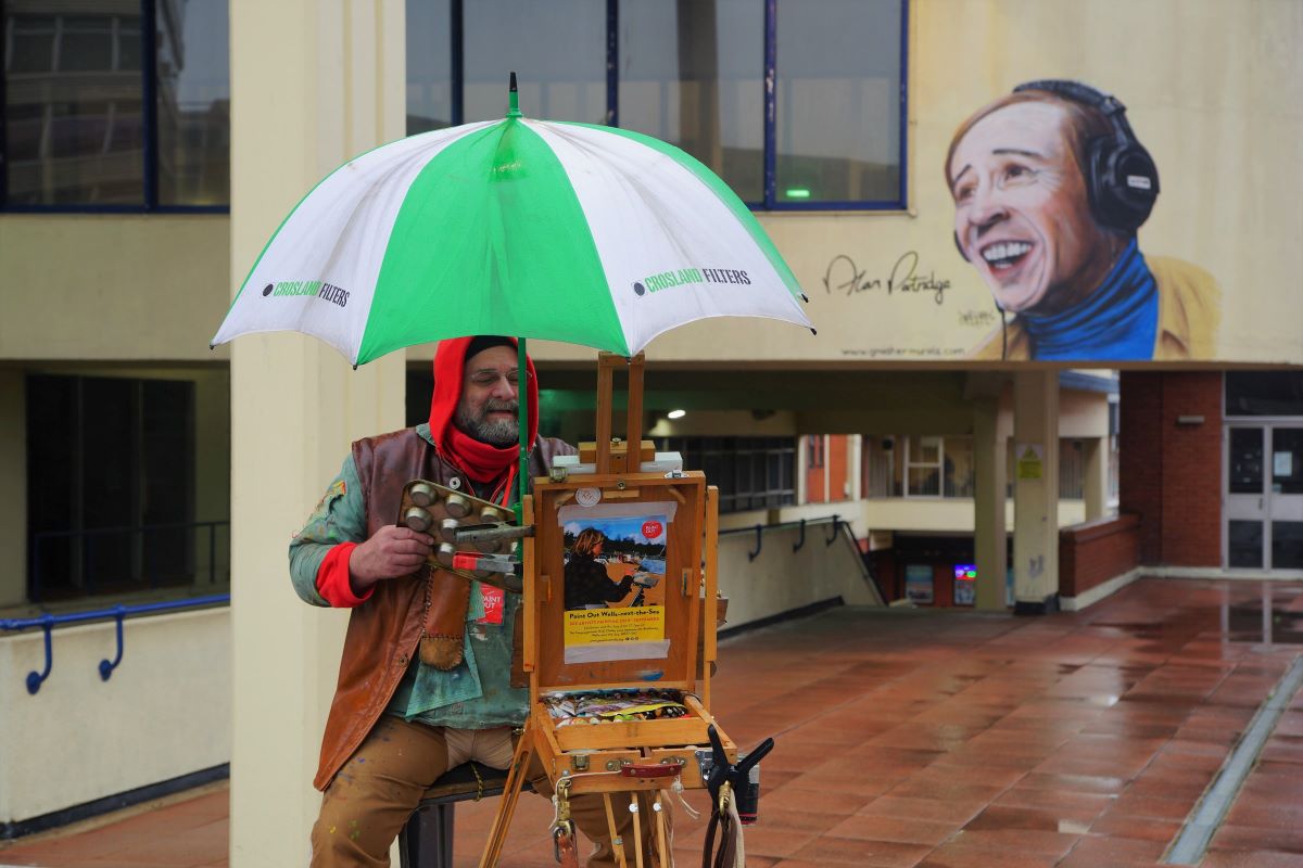 Artist John Behm painting Anglia Square outside Hollywood Cinema, Paint Out Norwich