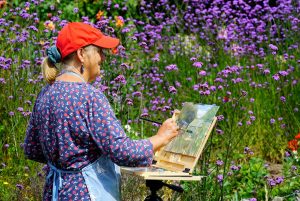 Artist Kate Gabriel painting Winterton allotments, Paint Out Norfolk 2020